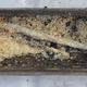 The opened box, with its beeswax contents inside.